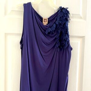 Deep indigo blue, left shoulder leaf like design